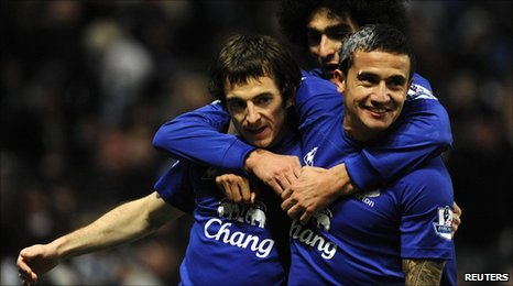 Cahill and Baines celebrate