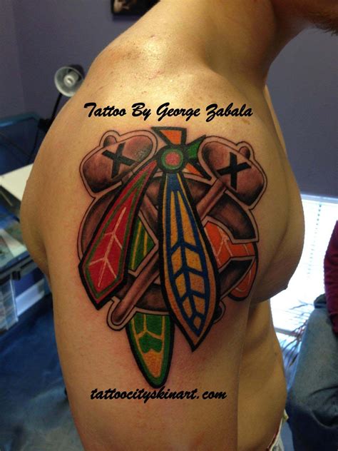 Chicago Blackhawks feathers logo tattoo by George Zabala. Tattoo City ...