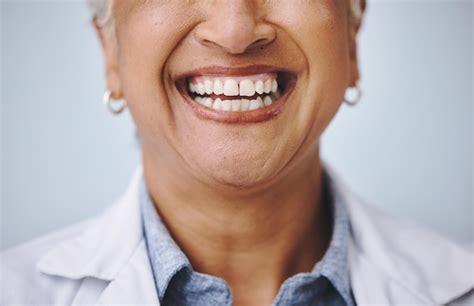 Premium Photo | Dental smile and elderly woman in studio for mouth ...