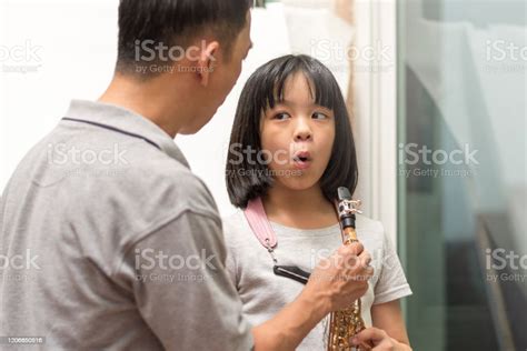 Father Teaching Daughter To Play Saxophone Dad Train Asian Kid Girl ...