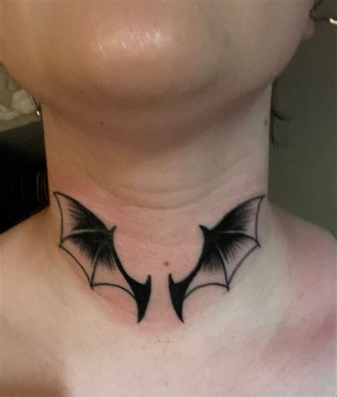 Elegant Bat Wings Neck Tattoo