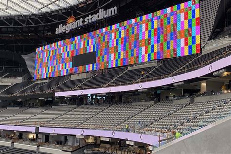 Raiders’ Allegiant Stadium video boards light up in Las Vegas ...