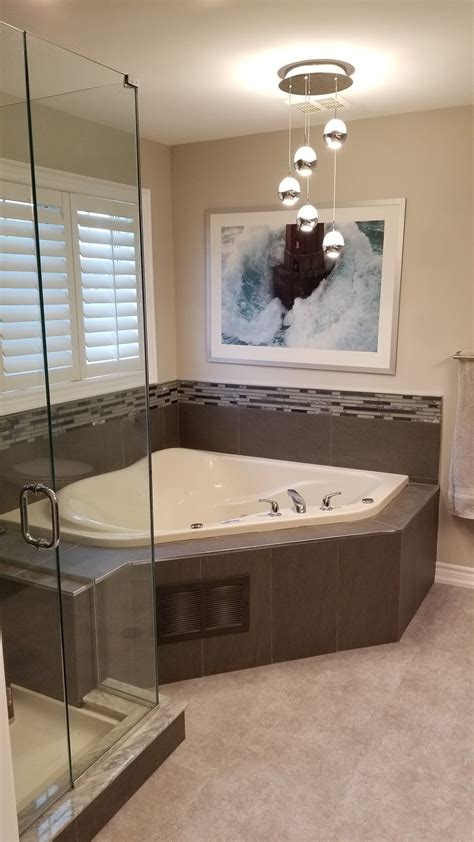 Updated jacuzzi tub with accent tiles | Tub remodel, Top bathroom ...