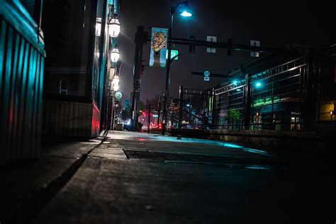 empty road at nighttime, low angle photography of lighted city street # ...