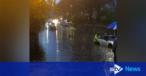 Flooding causes travel chaos across Aberdeen as safety warning issued ...