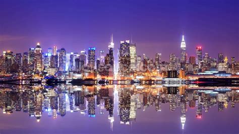 Download Sunrise over the Manhattan skyline in New York City Wallpaper ...