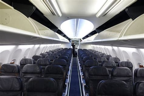 alaska airlines boeing 737-900 economy cabin has 165 seats arranged in ...