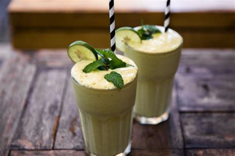 Premium Photo | Two smoothie drink made of super foods fruits mint