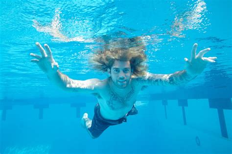 Nirvana’s Iconic ‘Nevermind’ Cover Baby Poses Again for Album’s 25th ...