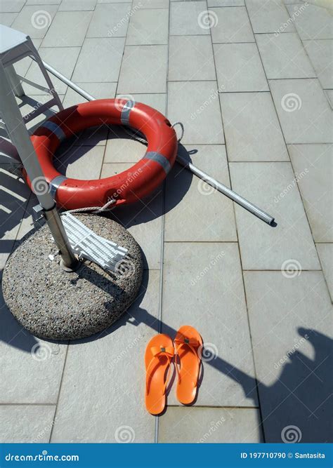 Lifeguard Equipment, Orange Lifebelt with Rope Hang on the Wall Near ...