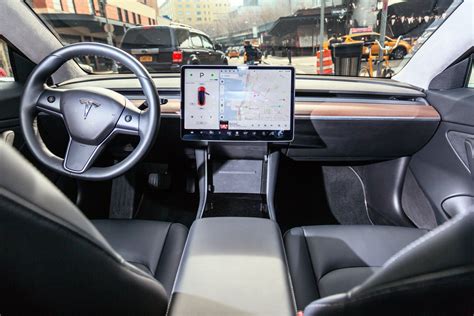 The Tesla interior revolutionized car design. 12 ways its tech-heavy ...