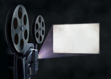 39265109 - movie projector and blank screen - The Cary Theater