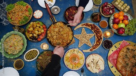 Ramadan iftar Eid. Muslim family has dinner at home. Table with ...