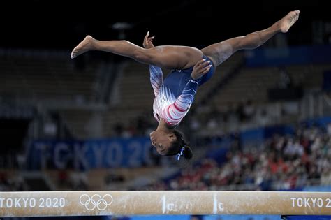 Simone Biles takes home a bronze in balance beam in Olympic return ...