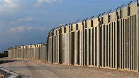 Greece erects fence at Turkey border amid warnings of Afghan migrant ...