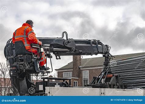 Crane Operator Unloads His Truck Editorial Image - Image of people ...