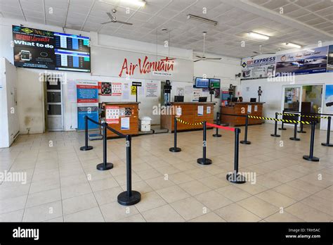 The Air Vanuata check-in desks at Port Vila Airport, Efate Island ...