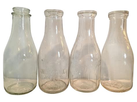 Vintage Milk Bottles - Set of 4 | Chairish