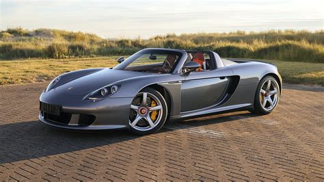 Jenson Button’s Porsche Carrera GT sells big at auction - Motoring Research