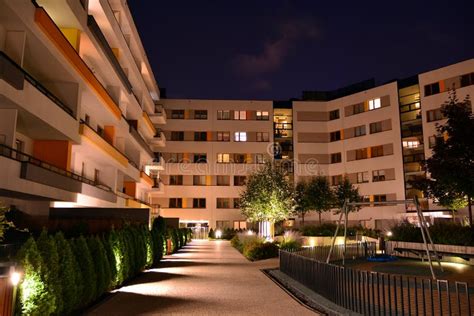 Exterior of Apartment Building at Night Stock Image - Image of ...