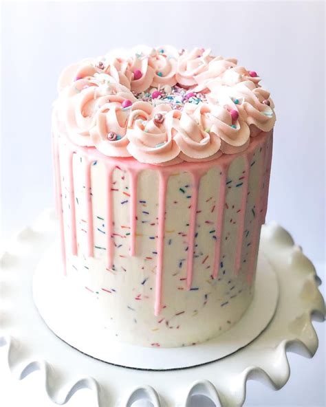 Sometimes all a cake needs is a pink drip and some sprinkles...lots of ...