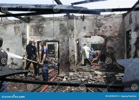 Firefighters Extinguish Fire Burning Home Editorial Image - Image of ...