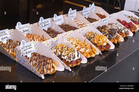 Belgian waffles with colorful toppings on showcase. Brussels Stock ...