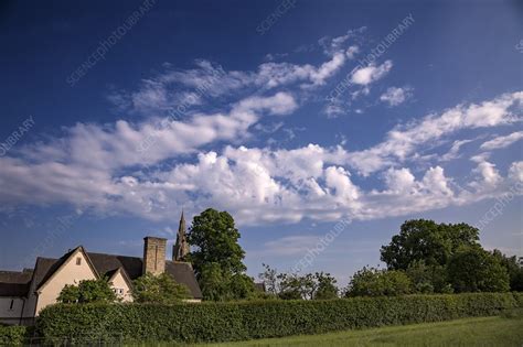 Altocumulus castellanus clouds over a rural scene - Stock Image - C040 ...