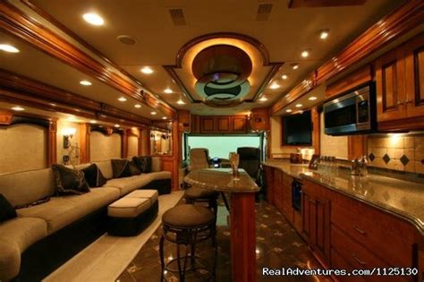 Luxury RV Interior. Modern wood grain and bar. | Rv trailers, Luxury rv ...