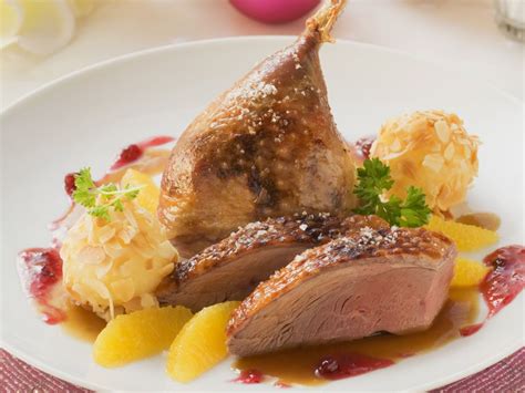 Roast Christmas Duck with Orange Sauce and Dumplings Recipe | EatSmarter