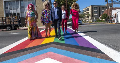 City begins unveiling updated rainbow crosswalks at Broadway Corridor ...