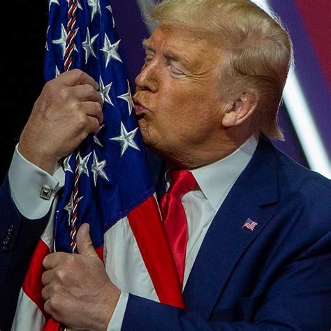 Watch Trump Fondle an American Flag at CPAC