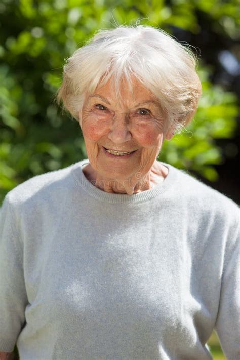 Portrait Of A Smiling Senior Woman Royalty Free Stock Photo - Image ...