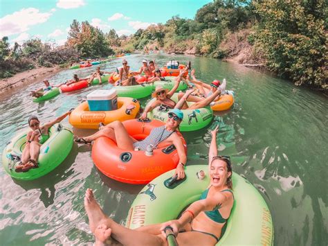 Tubing on the San Marcos River near Austin, TX - Suitcase and Heels