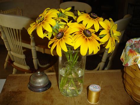 A bouquet of black eyed susans | Black eyed susan, Garden, Table ...