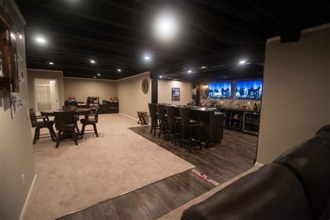 Black Painted Ceiling vs White Painted Ceiling in Michigan Basements