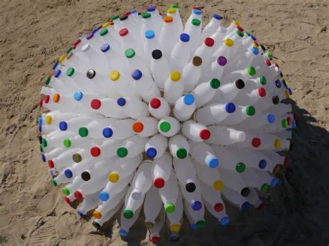 there is a large white object made out of plastic bottle caps on the ...