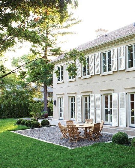 White shutters, off-white house.