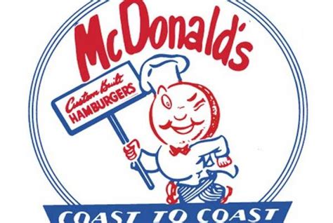 the logo for mc donald's hamburgers, with a cartoon character holding a ...