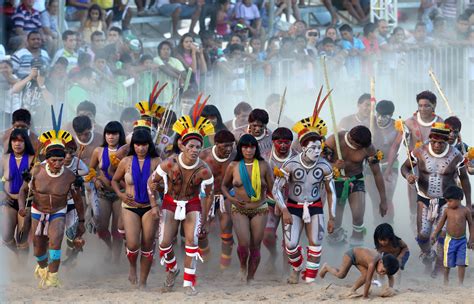 Members of Brazilian indigenous group Kuikuro dance during the XII ...