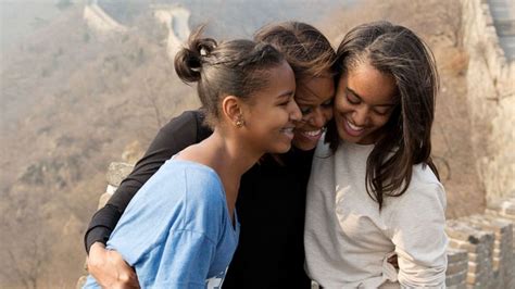 Michelle Obama talks how she and Barack view daughters' dating lives ...