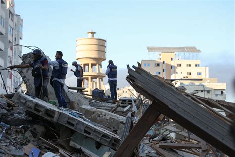 In pictures: Aftermath of Israel strike on Gaza building used by media ...