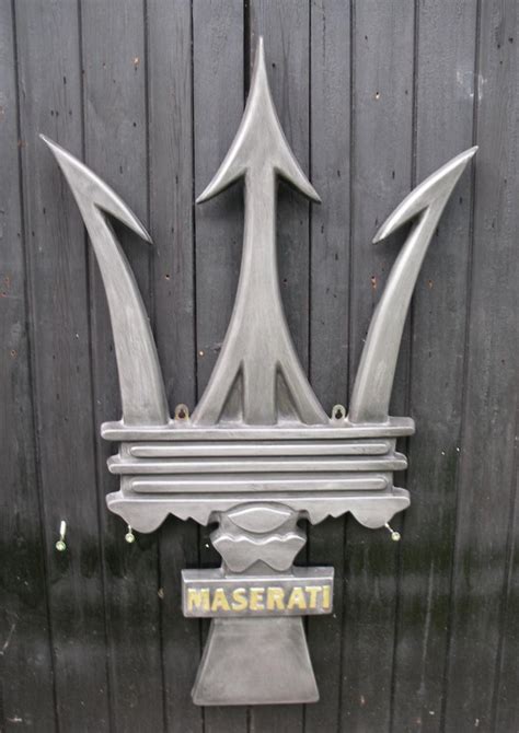 Bonhams Cars : A cold-cast aluminium Maserati Trident emblem,