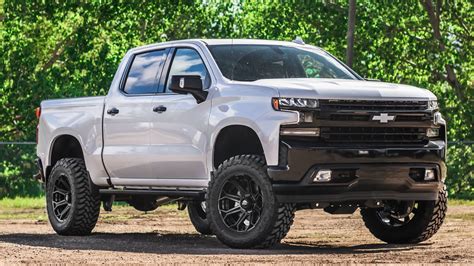 Lifted Silver Chevy Silverado: The Ultimate Off-Road Machine - Click ...