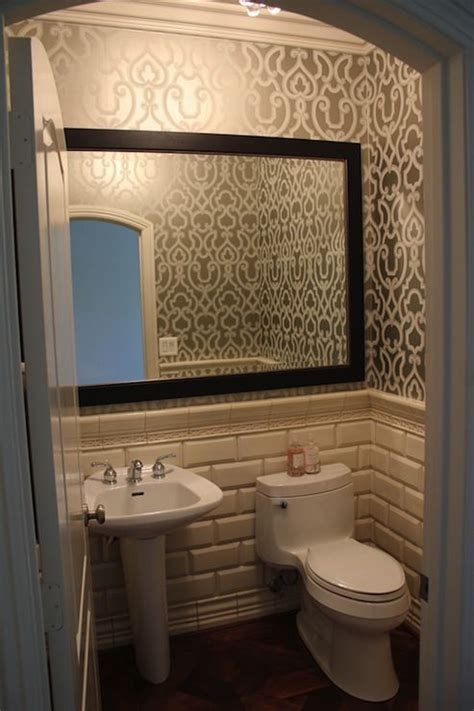 Dramatic powder room with silver metallic trellis patterned wallpaper ...