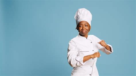 Free Photo | Excited smiling woman cook doing dance moves on camera ...