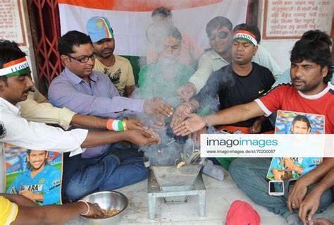 RANCHI, INDIA - MARCH 30: Indian Cricket fans performing rituals of ...