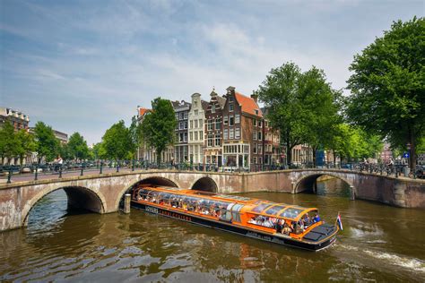 Orange Canal Boats in Amsterdam - Canals of Amsterdam