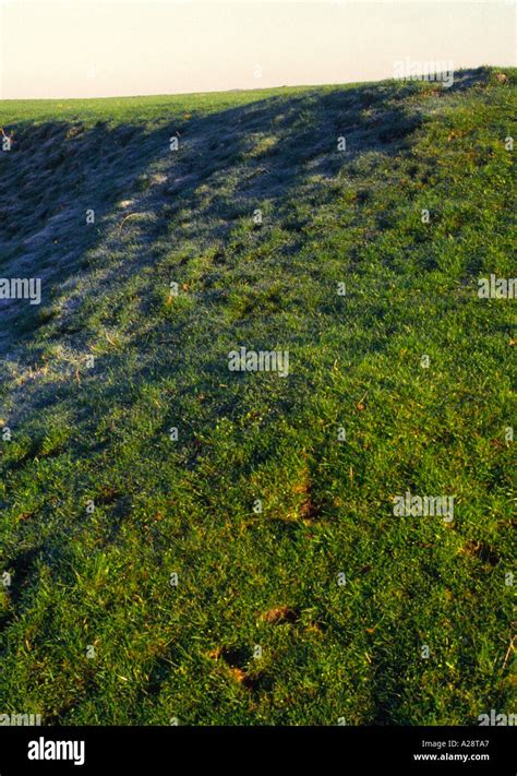 Aspect shown by frost on north facing slope Stock Photo - Alamy