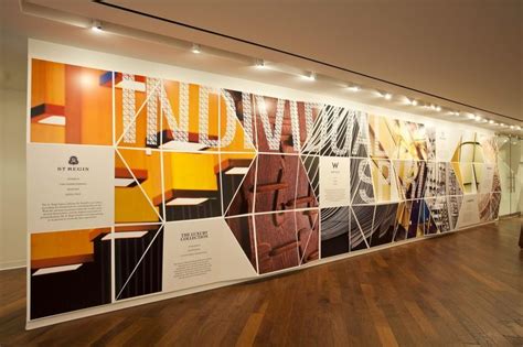 museum wall display - Google Search | Office wall graphics, Signage ...